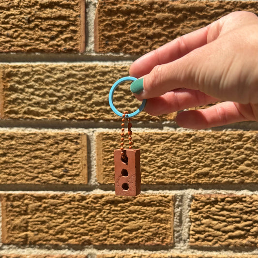 "Pride is a Protest" Brick Keychain